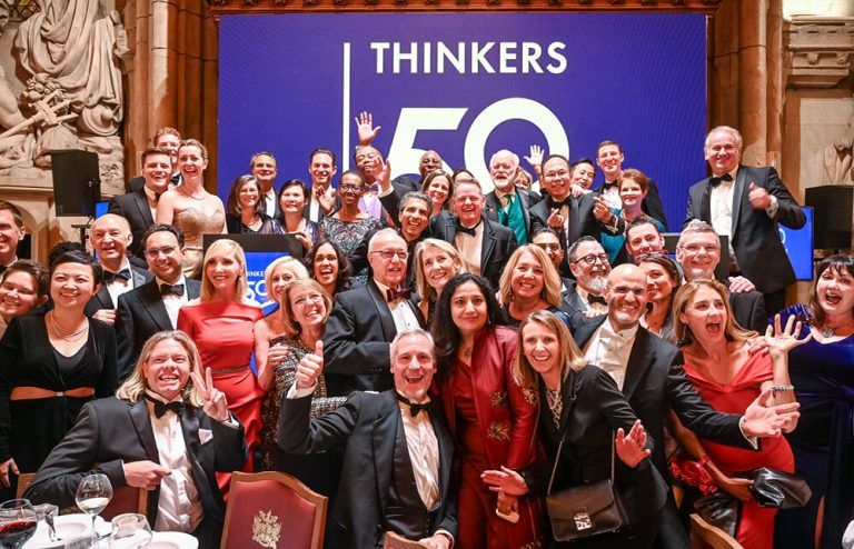 Thinkers50 Awards Gala attendees laughing and having fun in a group photo.